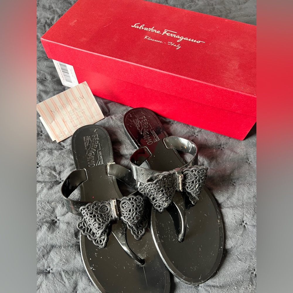 Authentic Ferragamo black sandals with receipt . Good condition !